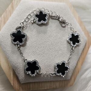 Elegant Silver and Black Clover Bracelet